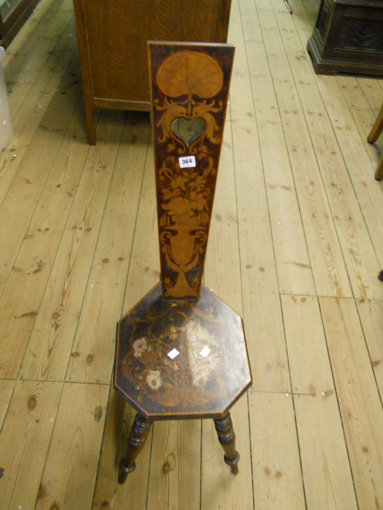 A mahogany spinning chair with penwork decoration, on turned legs