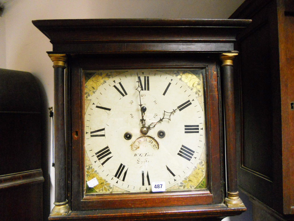 A 19th Century oak longcase clock, the painted square dial with subsidiary date wheel and marked