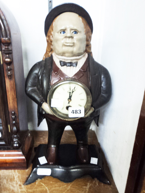 A reproduction Bradley & Hubbard novelty painted cast iron mantel timepiece, in the form of an