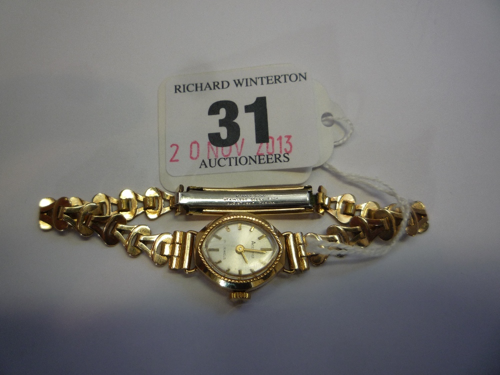 A 9CT LADIES ACCURIST WATCH