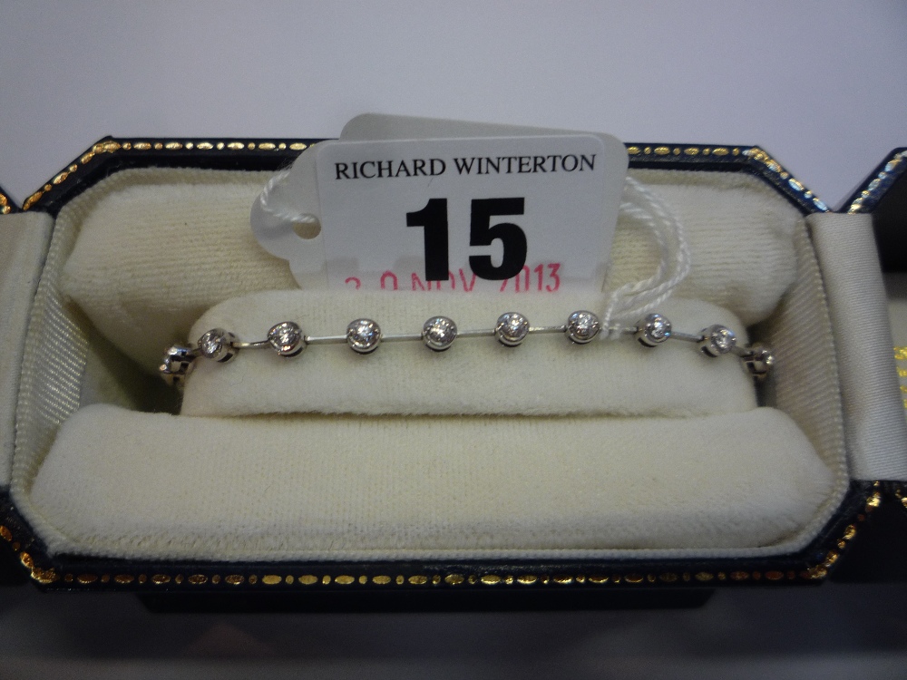 A BOXED 18CT WHITE GOLD DIAMOND BRACELET