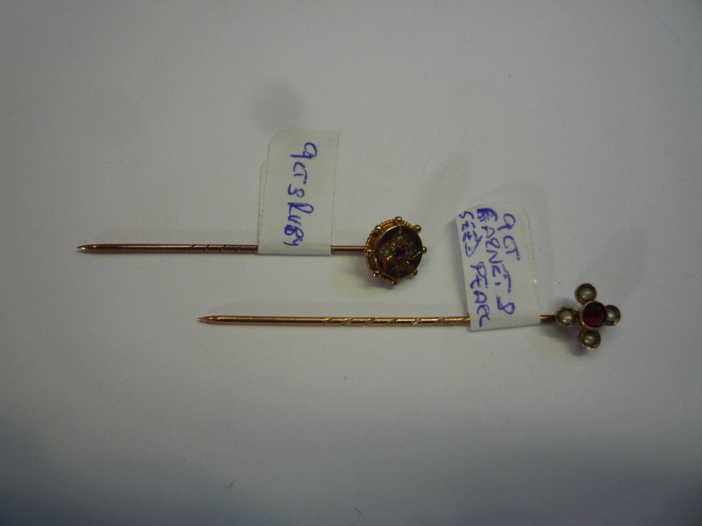 TWO 9CT GOLD STICK PINS, one set with garnet and seed pearls and the other with ruby (2)