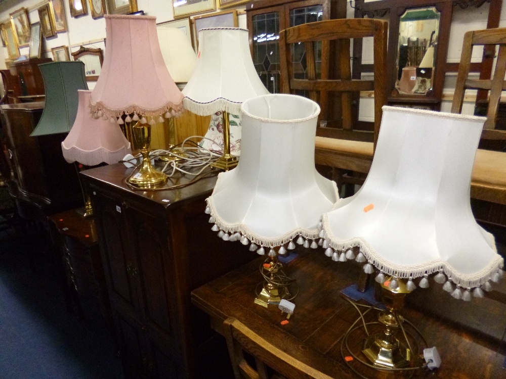 SEVEN BRASS TABLE LAMPS, with shades`