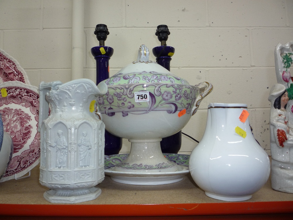 AN EDWARDIAN TUREEN AND STAND, two jugs and a pair of lamp bases (s.d.)