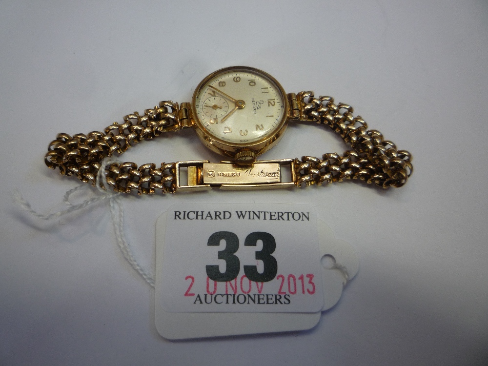 A LADIES 9CT GOLD RECORD WRISTWATCH, on a 9ct bracelet