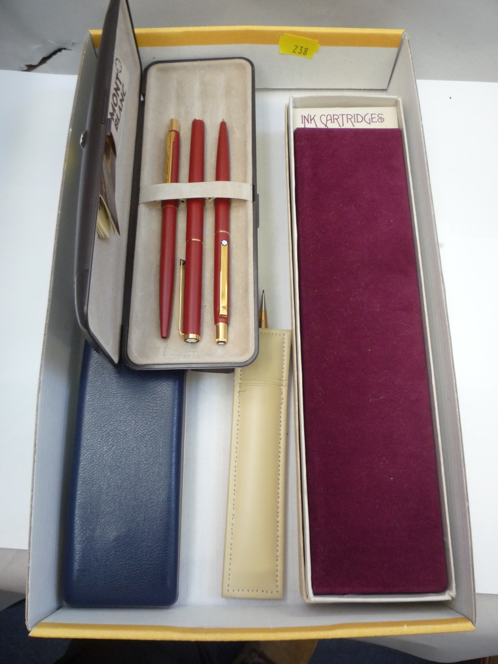 A MONT BLANC THREE PIECE BOXED PEN SET, a sterling silver Sheaffer fountain pen (boxed), a