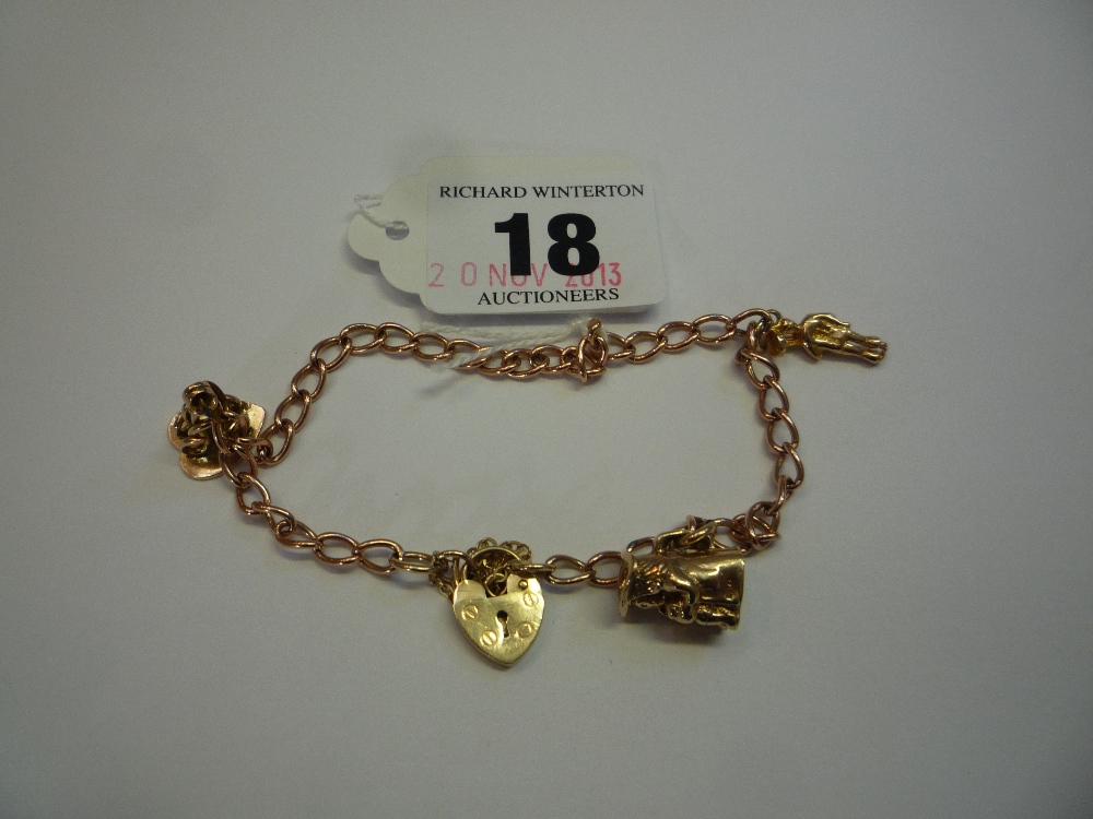 A 9CT CHARM BRACELET, with four charms, (approximately 12g)