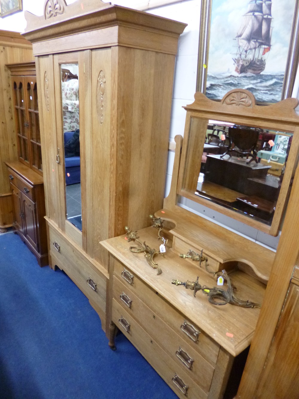 AN OAK MIRROR DOOR WARDROBE with drawer below and a matching dressing table (2)