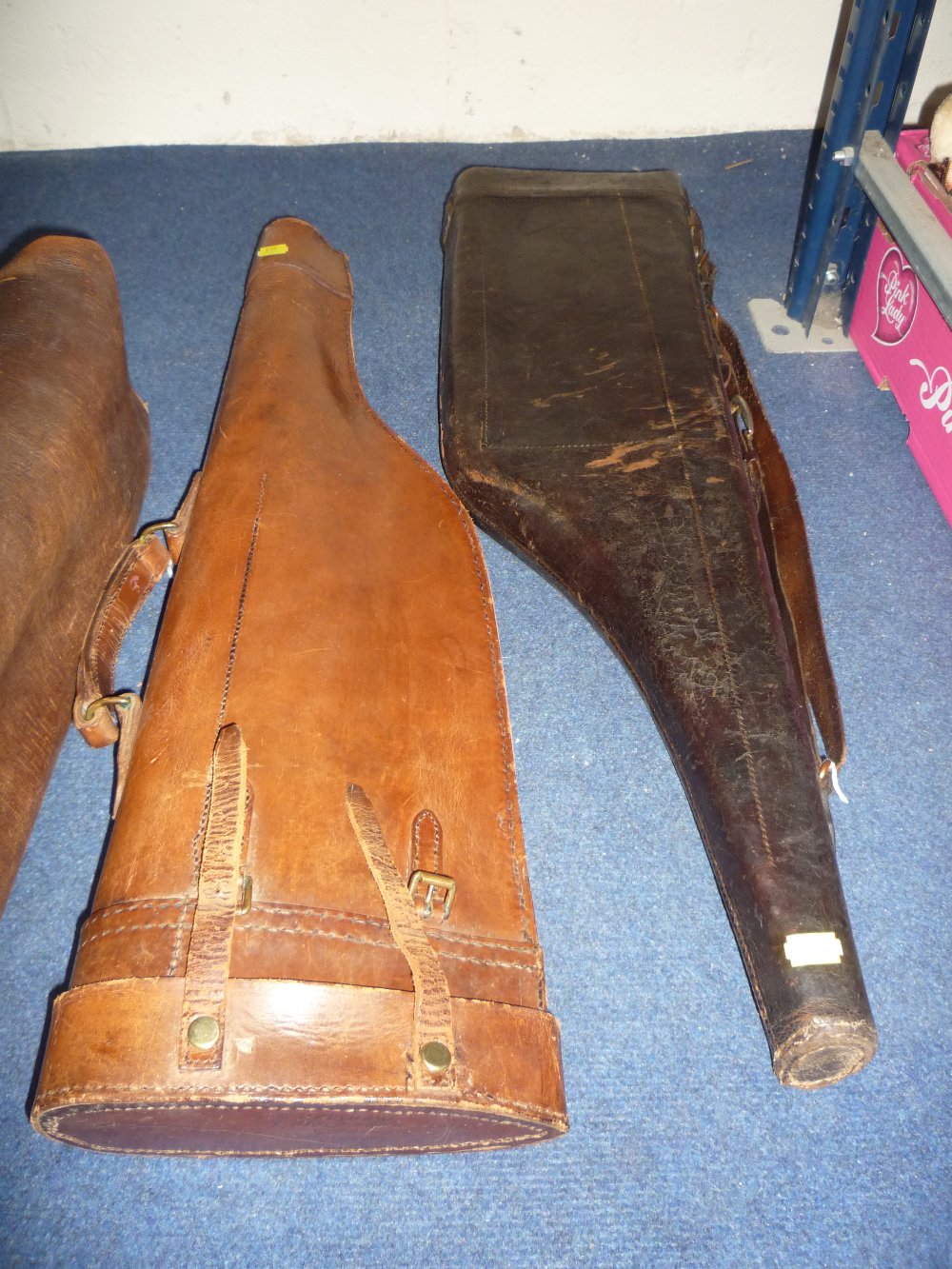 TWO LEATHER LEG OF MUTTON SHAPED GUN CASES, (2)