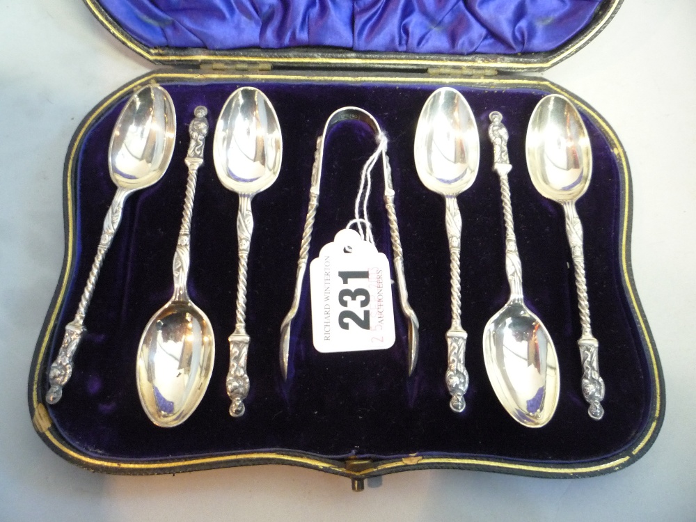 A CASED SET OF SILVER APOSTLE FINIAL TEASPOONS/TONGS, London 1898 (approximately 113g in all)