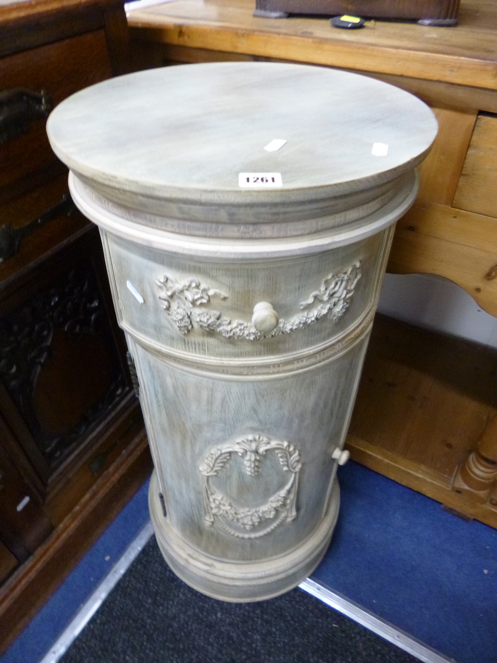 A MODERN CYLINDRICAL POT CUPBOARD with drawer