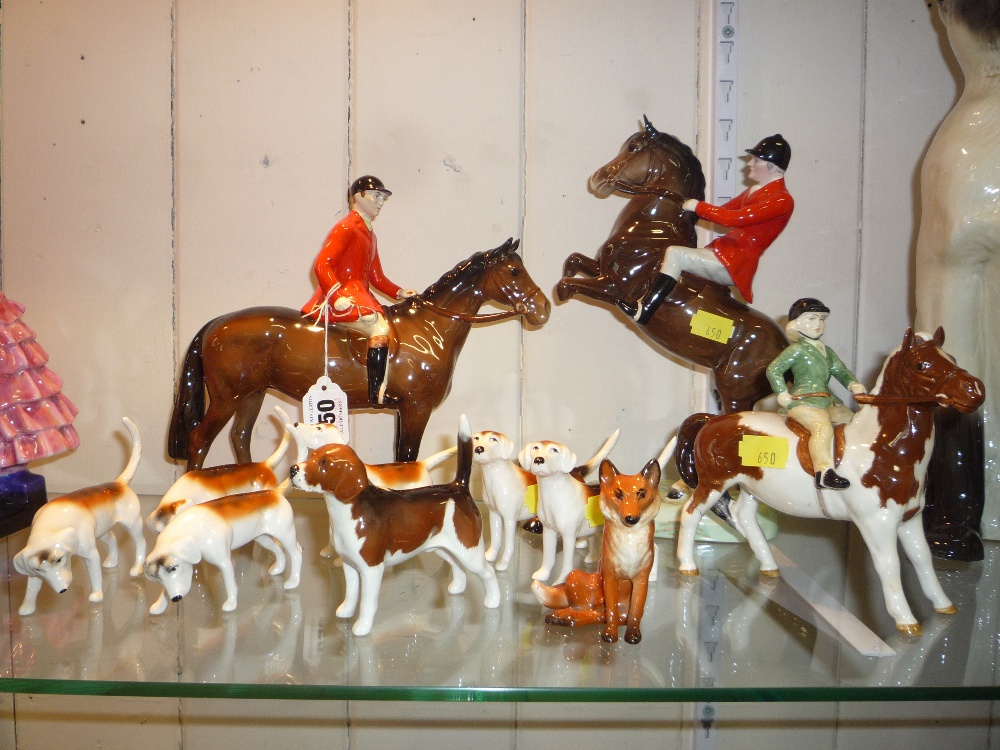 BESWICK HUNTING GROUP, comprising Huntsman (on Rearing Horse) No.868 (s.d.), Girl on Pony No.1499 (