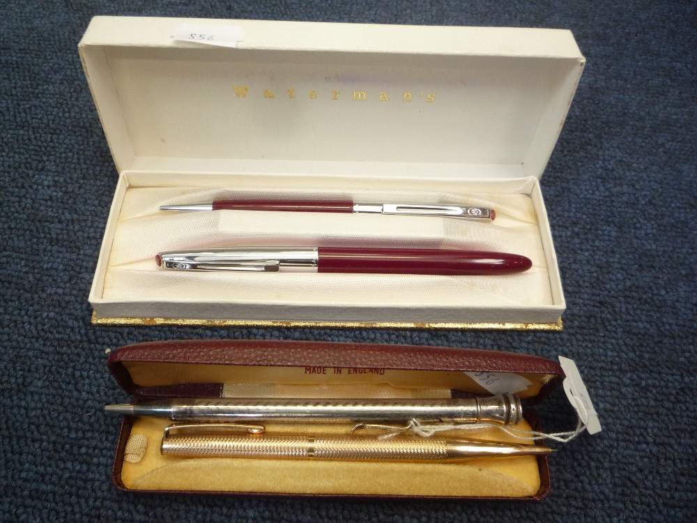 A MIXED LOT OF FOUR PENS, including gold plated and silver plated