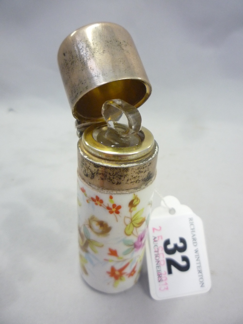 A CERAMIC CYLINDER SCENT BOTTLE