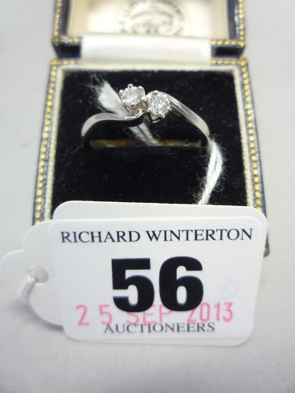 AN 18CT TWO STONE DIAMOND RING