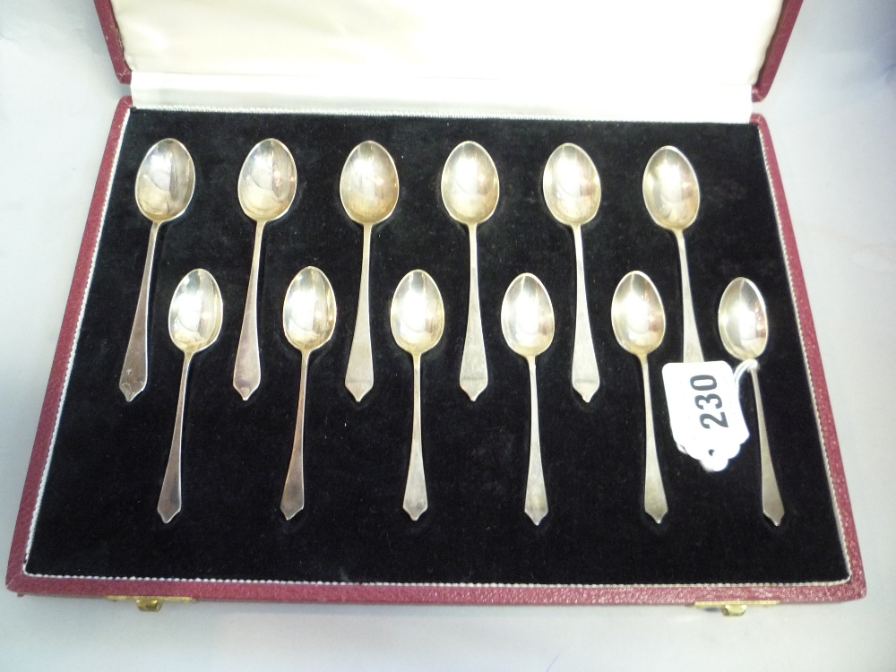 A CASED SET OF TWELVE SILVER SPOONS, mixed mint marks for 1967, trefoil finials