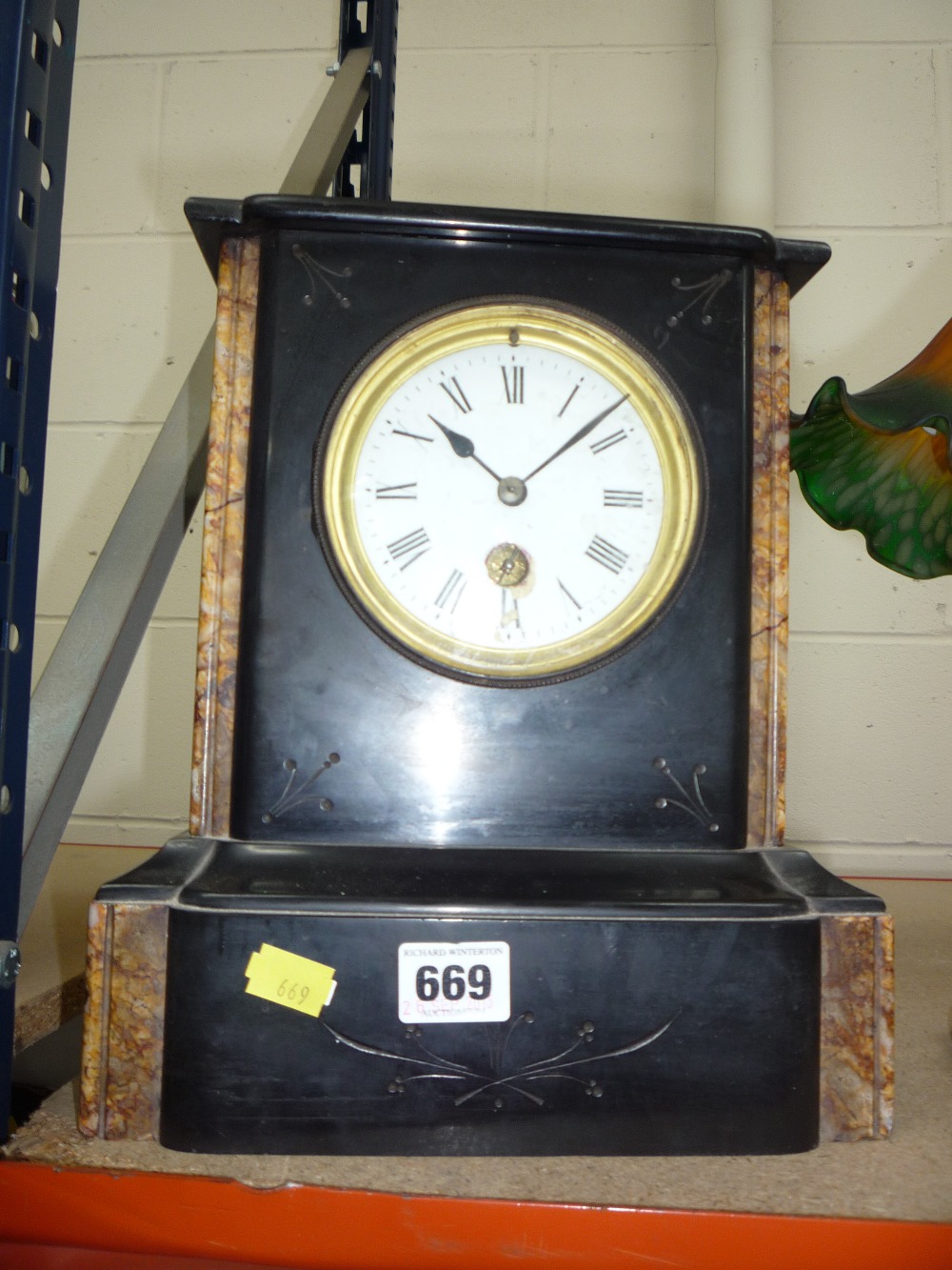 A SLATE MANTEL CLOCK