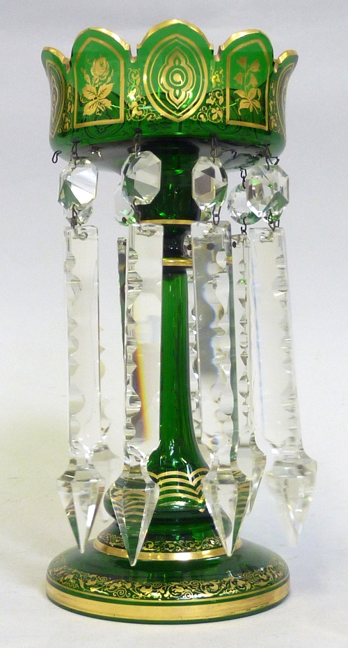 A GREEN GLASS LUSTRE, 19th Century, gothic arched rim, knopped tapered stem circular base, soft gilt