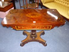 A 19th Century mahogany games table with painted decoration.