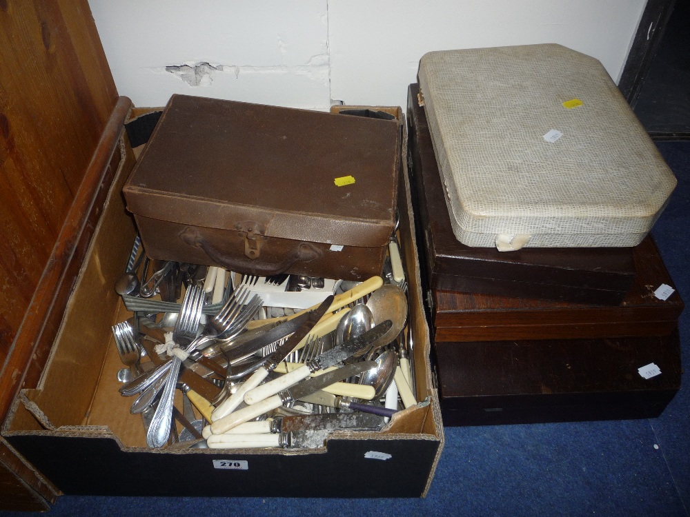 A quantity of loose and boxed cutlery (three empty canteens)