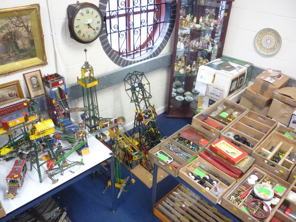 A large quantity of Meccano; to include models of Fairground rides, Blackpool Tower etc and a