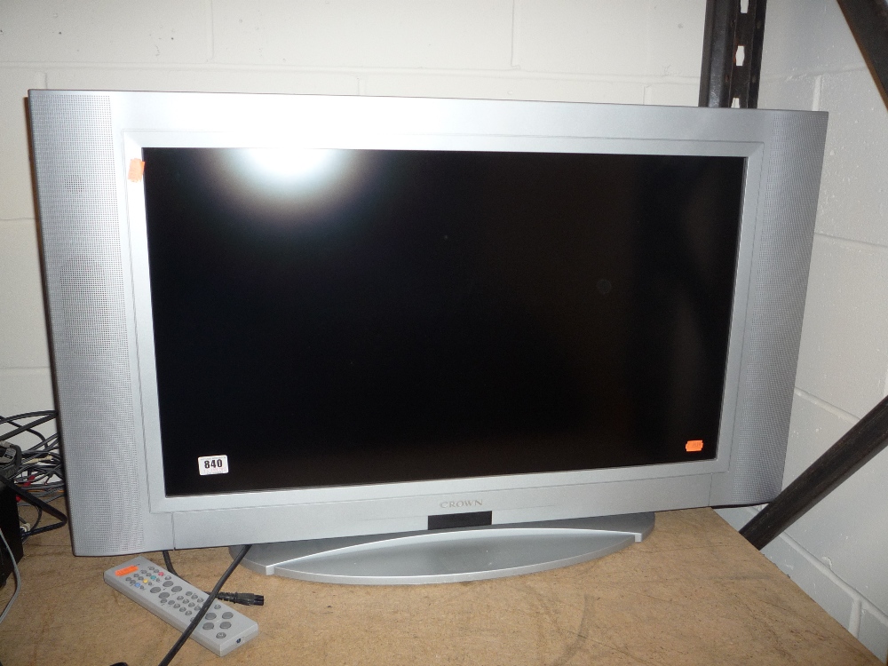 A `Crown` TV with remote