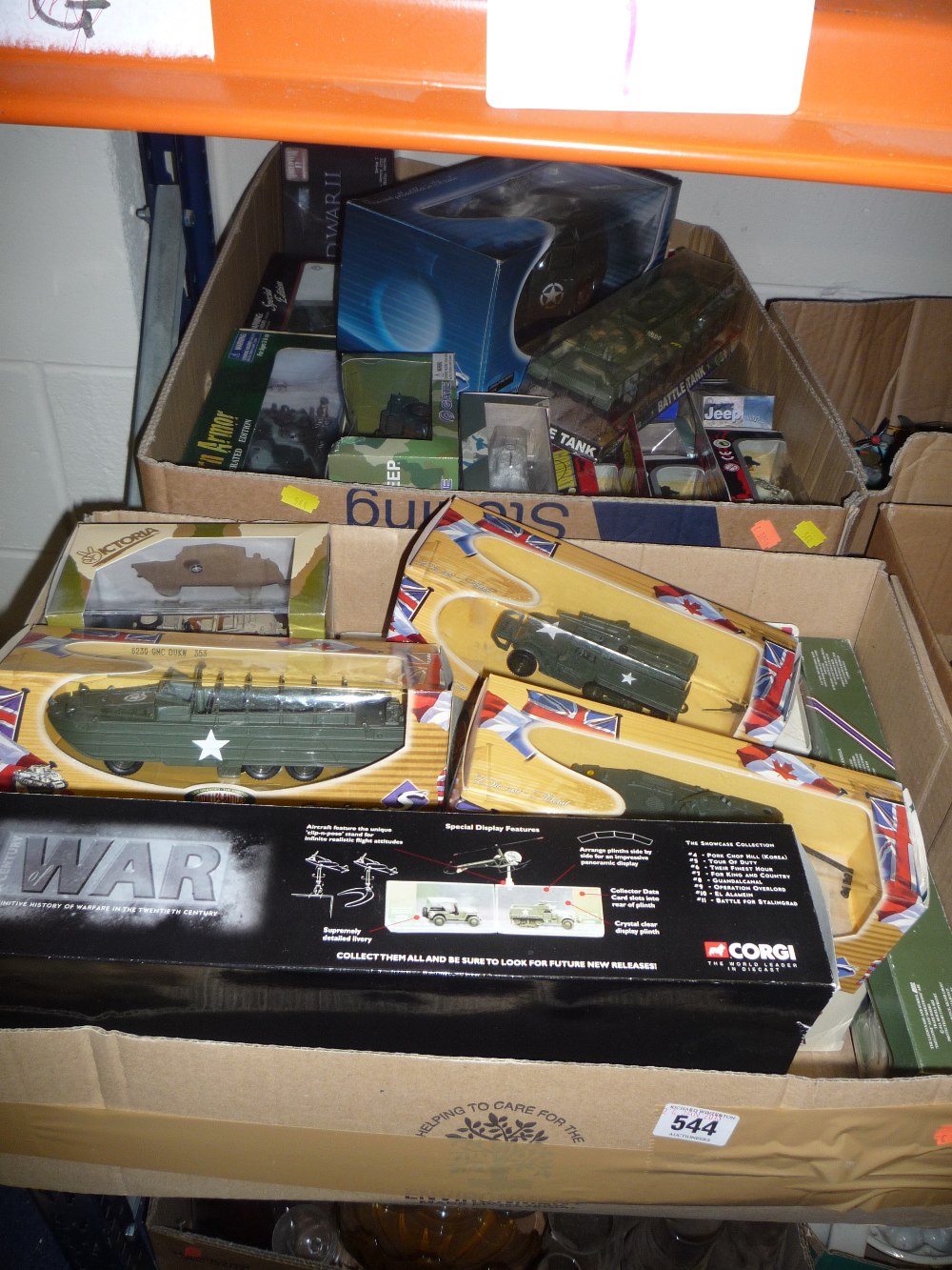 Two boxes of boxed die-cast military vehicles