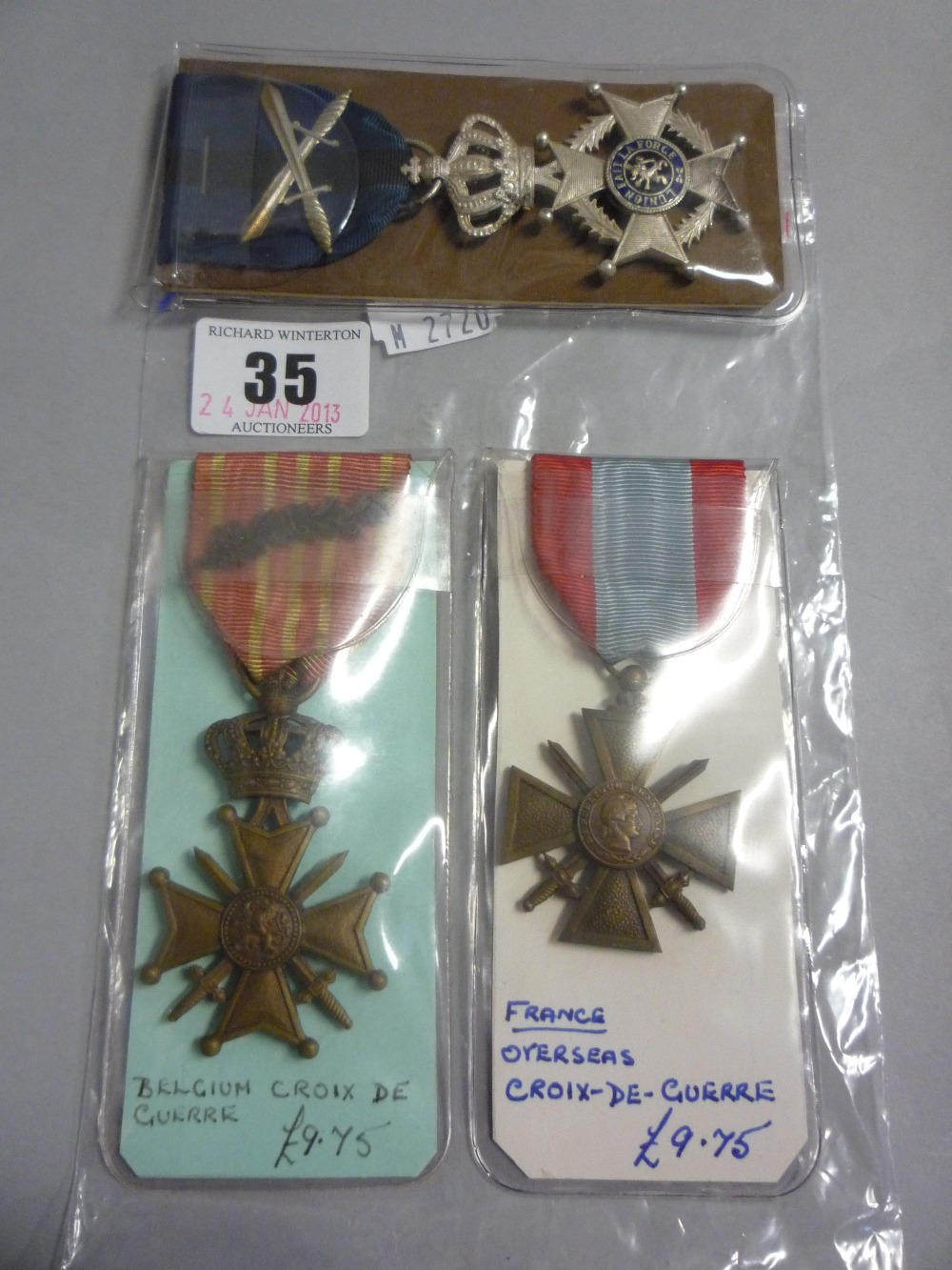 Two Belgian breast badges and a French Crois-De-Guerre (3)