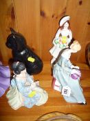 A Royal Doulton figure `Dorothy` HN3098 and three other ornaments (4)