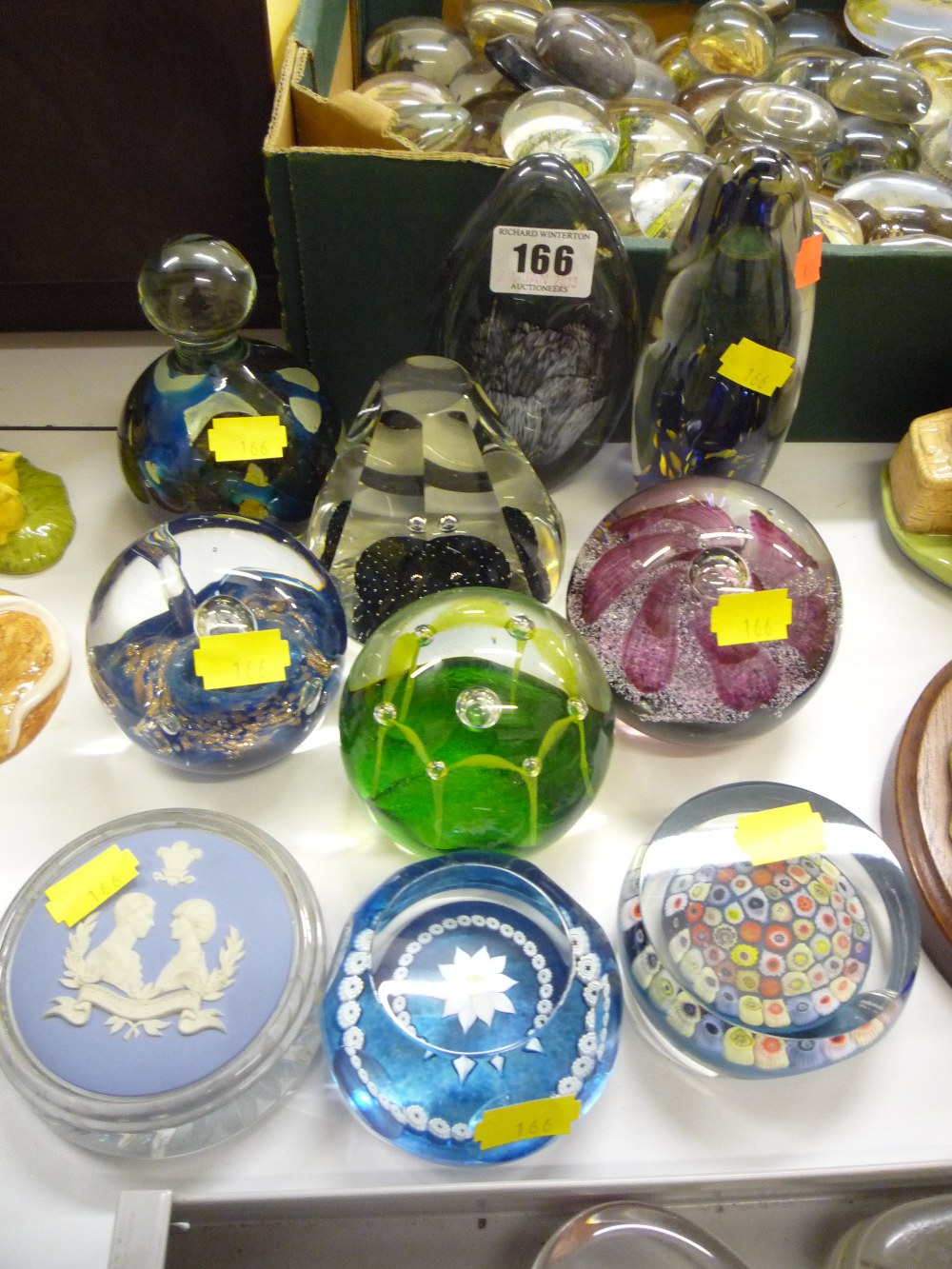 Ten glass paperweights, to include five Caithness, a Mdina etc