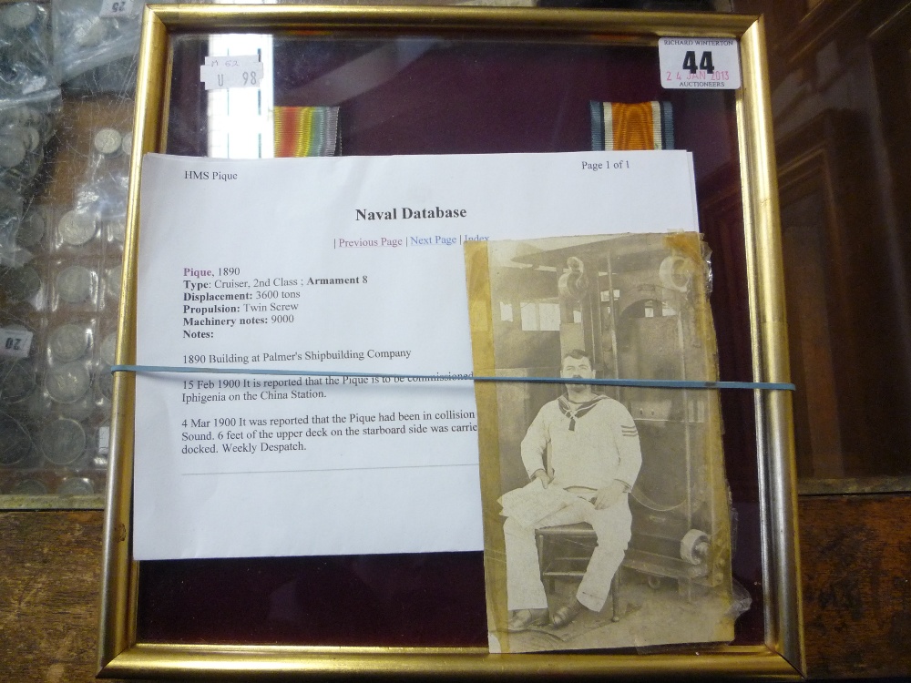 A framed and glazed family group, with a China War medal 1900 without ribbon or clasp and a WWI