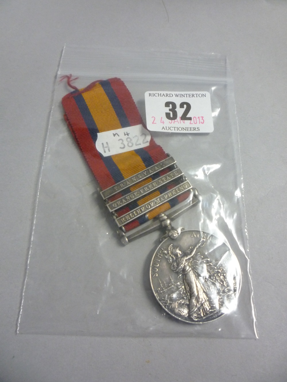 A Queen`s South Africa medal with the Relief of Mafeking, Orange Free State and Transvaal clasps