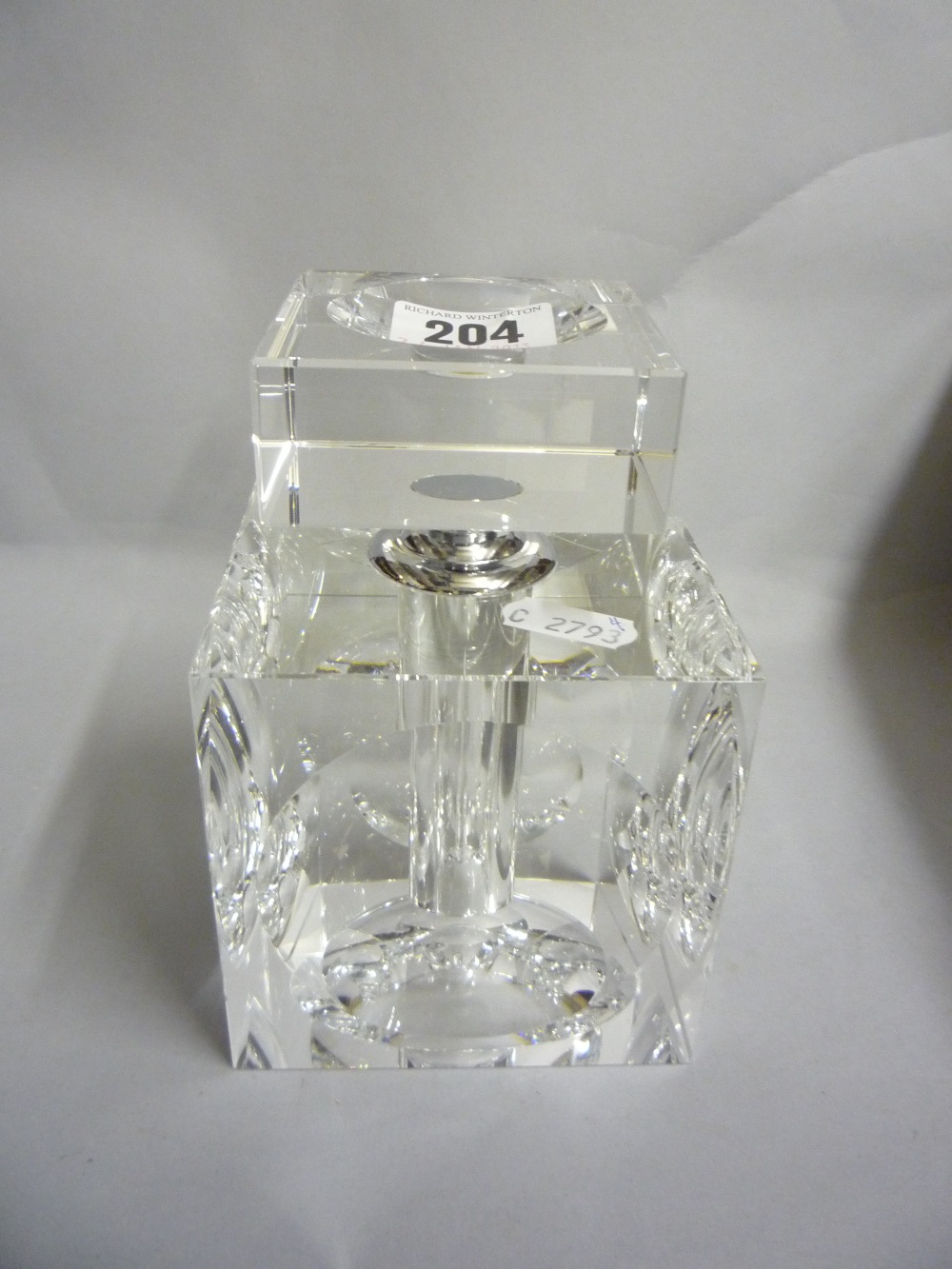 A large glass novelty scent bottle