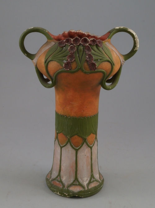 An Austrian Jugendstil reticulated painted terracotta vase, early 20th century, twin scrolling