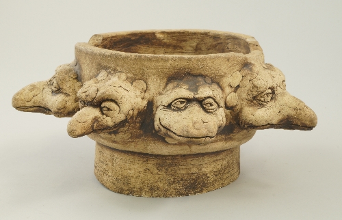 * A Martin Brothers style stoneware fitting decorated with grotesque wally type bird heads, late