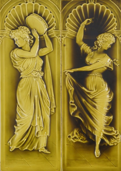 A pair of Minton Hollins & Co green glazed wall plaques, early 20th century, of rectangular form and