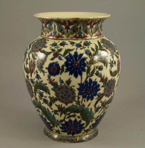 A large Zsolnay art pottery vase, late 19th century, of baluster form, the flared top decorated with