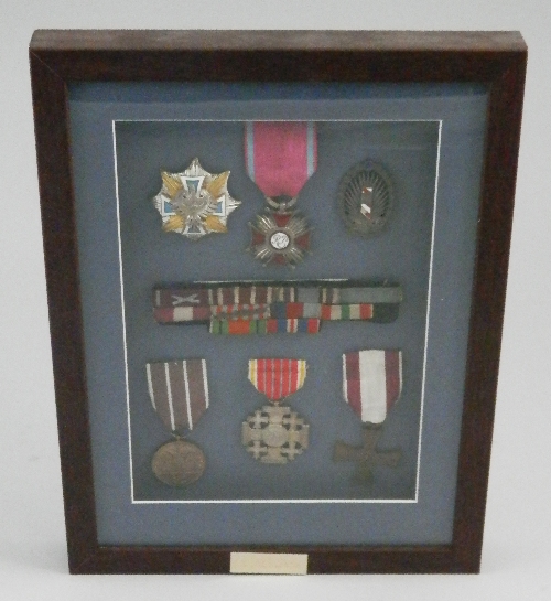 A Second World War Polish medal group to Z.A.Jackowski, with medal ribbons, a cap badge , a star and