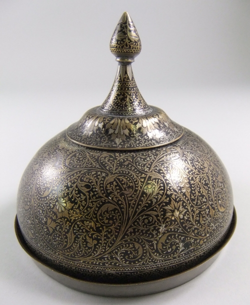 An Indian Moradabad brass dish and cover, 20th century, the dish of circular form beneath domed