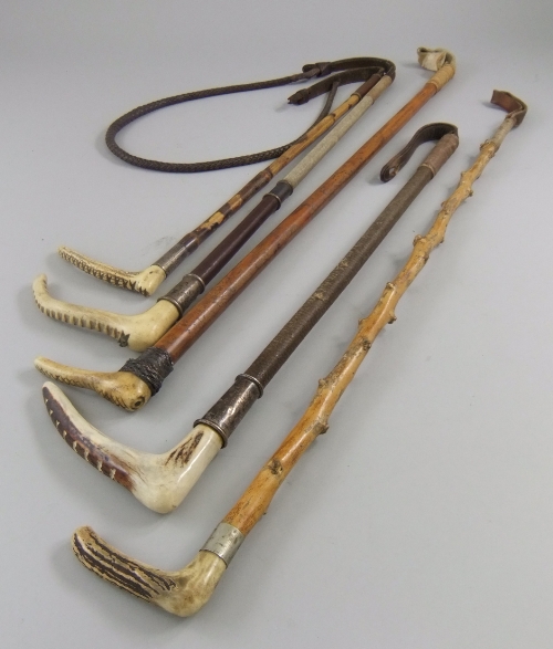 A collection of mostly antler handled and silver mounted whips and crops, of various sizes and