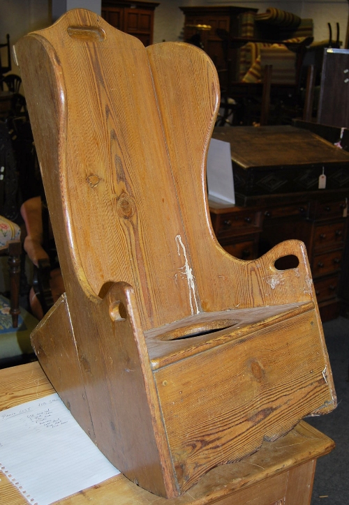 A 19th Century Scandinavian pine childs rocking chair