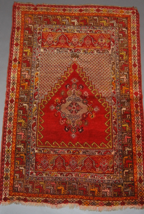 A pair of Turkish Melas prayer rugs with hook edged red mihrabs  within multiple border, 162 x 106