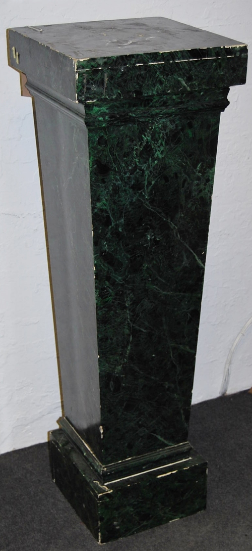 A simulated marble pedestal, drag-painted in dark green, 105cm high x 37 wide