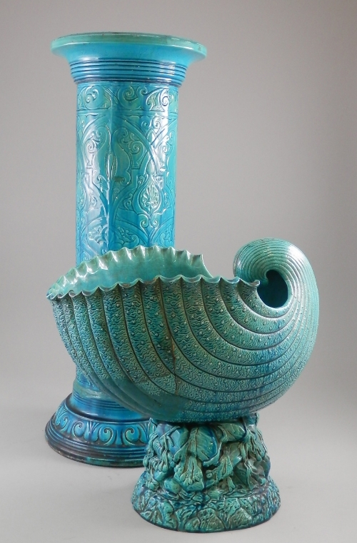 A Burmantofts blue faience shell form jardiniere on associated stand, early 20th century, of shell