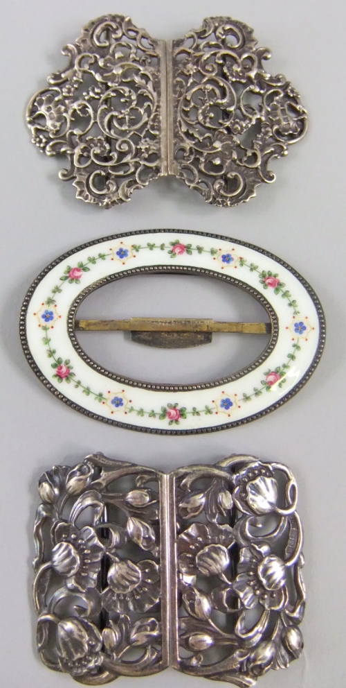 A silver waist clasp of Art Nouveau floral design 1986 together with a silver Rococo style waist