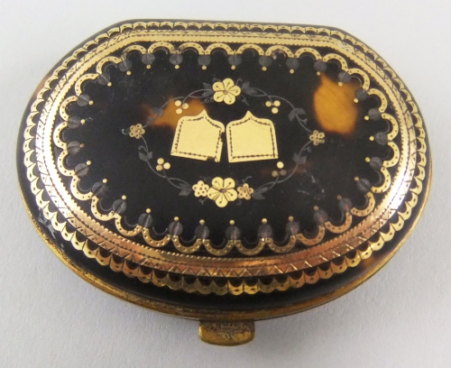 A 19th century tortoiseshell and pique decorated coin purse with blue silk moire interior. (af) 4.
