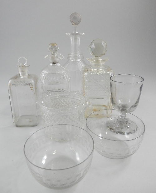 A quantity of miscellaneous glass items, 19th century and later, to include glass decanters with