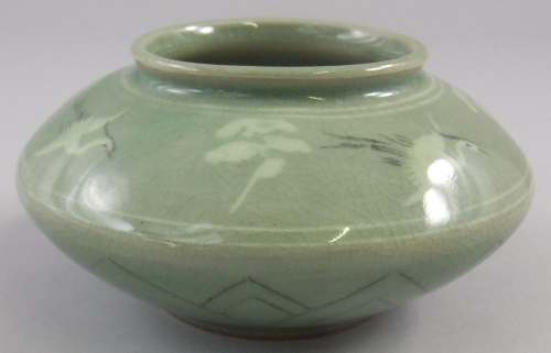 A Korean pale green celadon vase, possibly by Shing Sang Ho, 20th century, of ovoid form,