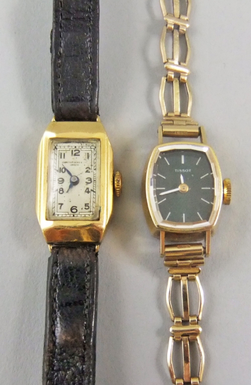 An 18ct gold cased ladies cocktail watch of rectangular form, fitted with a leather strap together