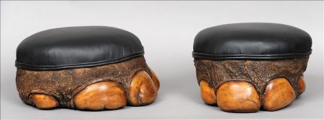 A pair of Victorian bull elephant foot footstools Each of typical form with a later leather padded
